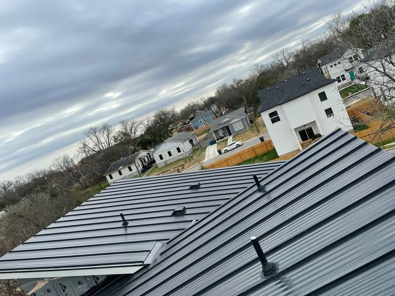 Standing seam metal roof panels with vents for Skylight Repair in Irvington